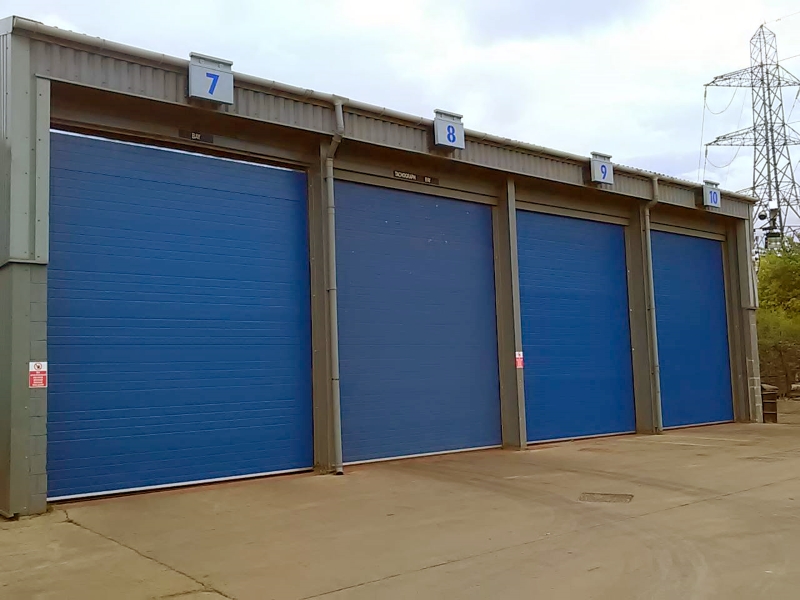 Blue sectional overhead doors